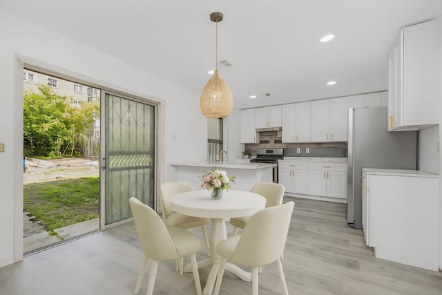 975 E 178th St, Bronx, NY 10460 - dining room featuring recessed lighting and light wood-type flooring