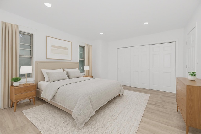 975 E 178th St, Bronx, NY 10460 - bedroom featuring light wood-style flooring, a closet, and recessed lighting