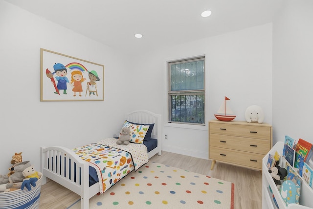 975 E 178th St, Bronx, NY 10460 - bedroom featuring light wood finished floors and recessed lighting