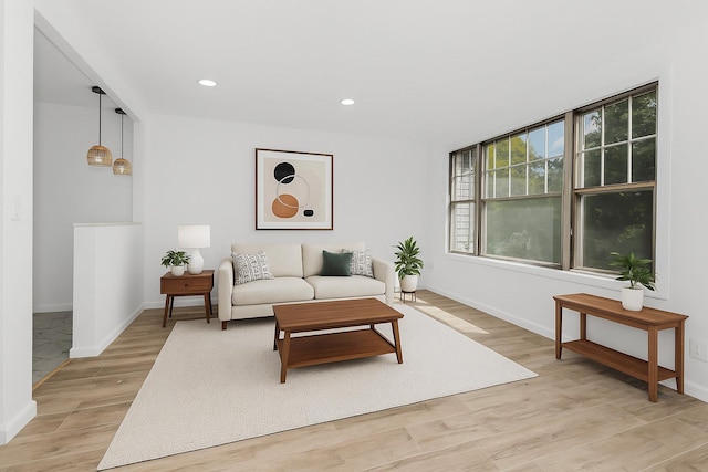 975 E 178th St, Bronx, NY 10460 - living area with light wood finished floors and recessed lighting