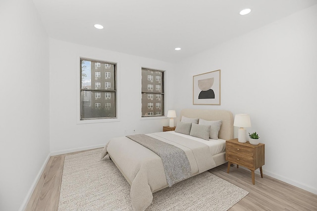 975 E 178th St, Bronx, NY 10460 - bedroom with light wood-type flooring and recessed lighting