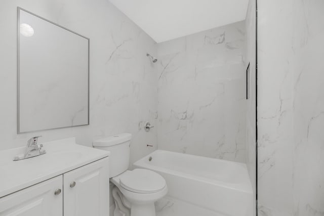 975 E 178th St, Bronx, NY 10460 - bathroom with vanity, marble look tiles, and bathing tub / shower combination
