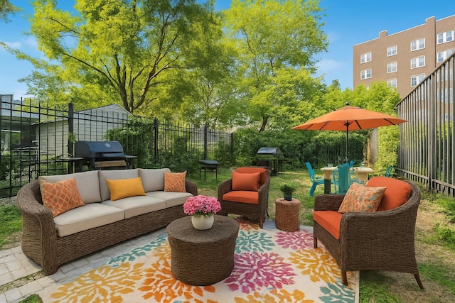 975 E 178th St, Bronx, NY 10460 - fenced backyard featuring an outdoor hangout area, area for grilling, and a patio