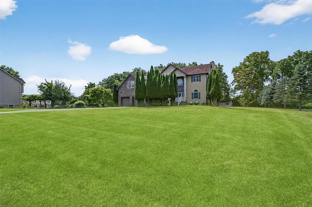 70 Hosner Mountain Rd, Hopewell Junction, NY 12533 - view of grassy yard featuring a garage