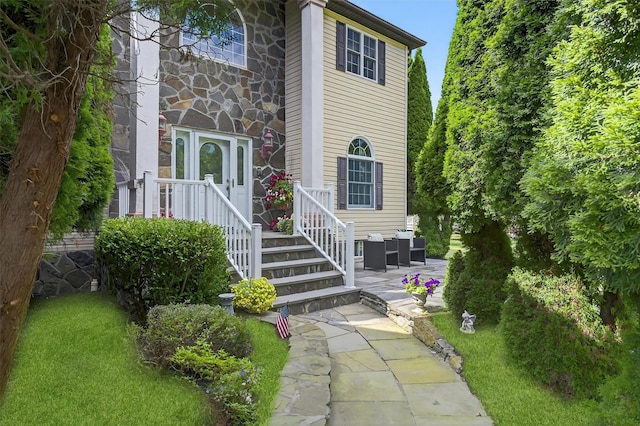 70 Hosner Mountain Rd, Hopewell Junction, NY 12533 - view of front of property featuring stone siding and a patio