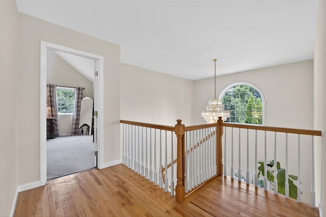70 Hosner Mountain Rd, Hopewell Junction, NY 12533 - hallway with a chandelier and wood finished floors