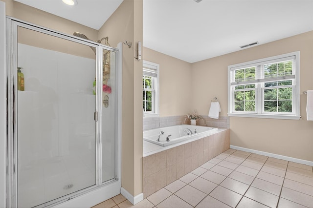 70 Hosner Mountain Rd, Hopewell Junction, NY 12533 - full bath with a stall shower, a garden tub, and tile patterned flooring