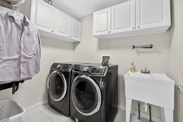 70 Hosner Mountain Rd, Hopewell Junction, NY 12533 - laundry room featuring cabinet space, washer and clothes dryer, and light tile patterned flooring