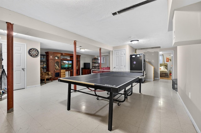 70 Hosner Mountain Rd, Hopewell Junction, NY 12533 - game room featuring baseboards and a textured ceiling