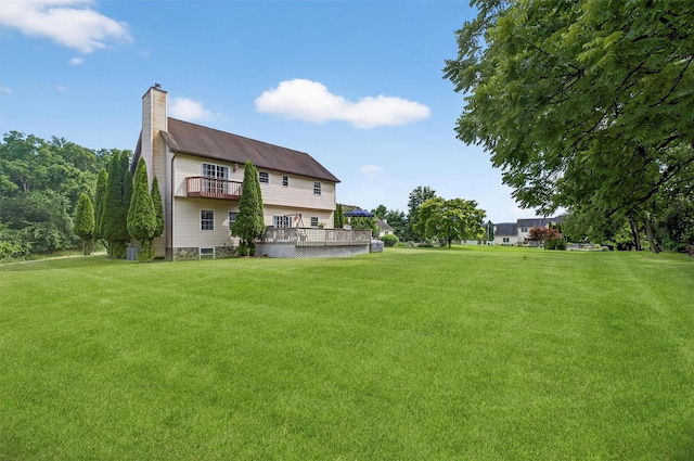 70 Hosner Mountain Rd, Hopewell Junction, NY 12533 - view of green lawn featuring a balcony and a wooden deck
