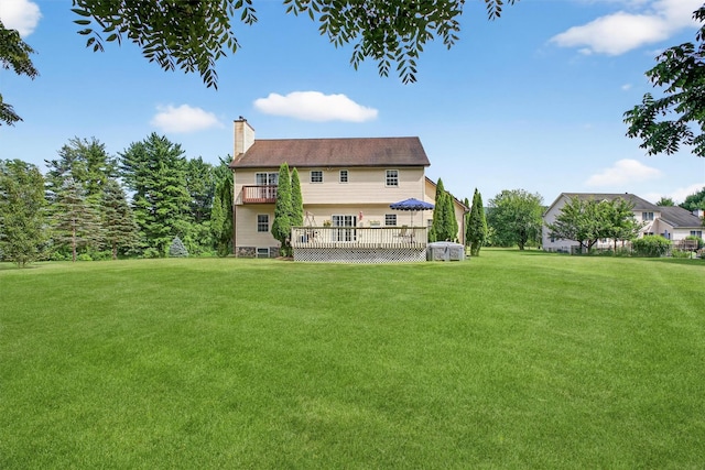 70 Hosner Mountain Rd, Hopewell Junction, NY 12533 - back of property featuring a lawn, a chimney, a deck, and a balcony