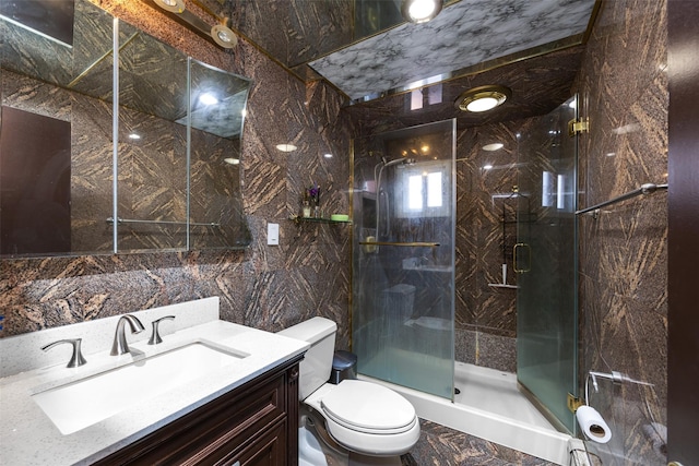 15 Linden St, Great Neck, NY 11021 - bathroom with vanity, a stall shower, and tile walls
