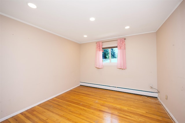15 Linden St, Great Neck, NY 11021 - spare room with a baseboard radiator, crown molding, light wood-type flooring, and recessed lighting