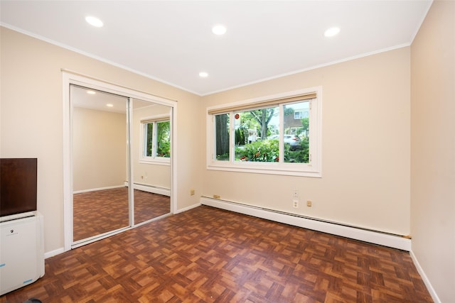15 Linden St, Great Neck, NY 11021 - unfurnished bedroom with baseboard heating, multiple windows, ornamental molding, recessed lighting, and a closet