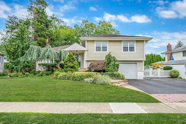 76 Keswick Ln, Plainview, NY 11803 - split level home with driveway and an attached garage