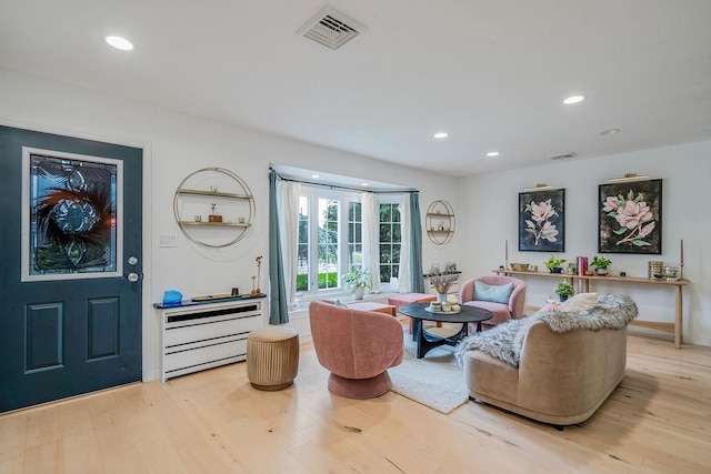 76 Keswick Ln, Plainview, NY 11803 - living area with light wood-style floors and recessed lighting