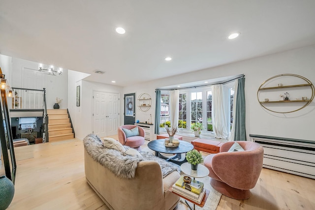 76 Keswick Ln, Plainview, NY 11803 - living area featuring stairway, recessed lighting, and light wood-style flooring