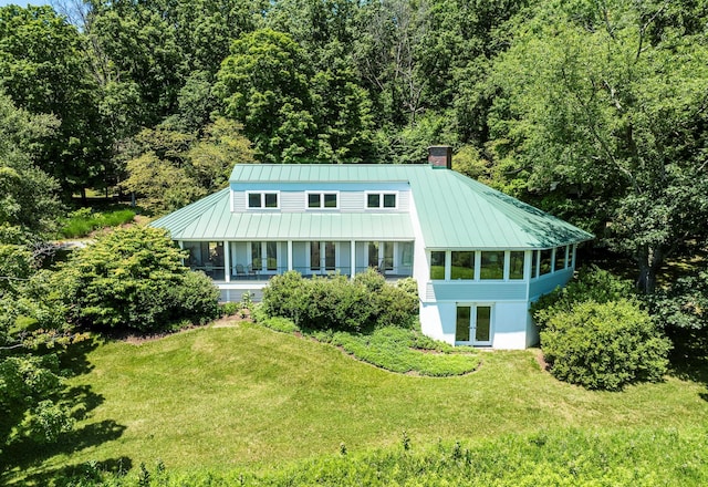 3778 State Route 82, Ancramdale, NY 12503 - view of front facade with a chimney, a standing seam roof, french doors, and a front lawn
