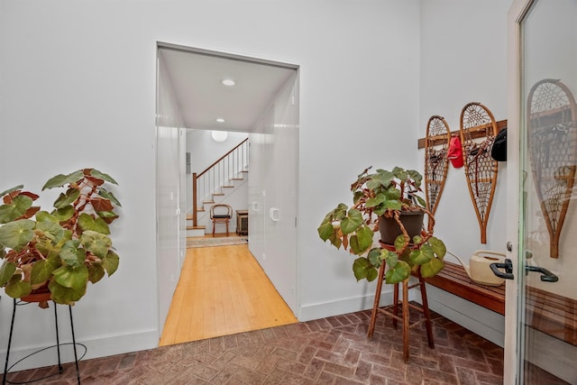 3778 State Route 82, Ancramdale, NY 12503 - hall with brick patterned floors, stairs, and recessed lighting