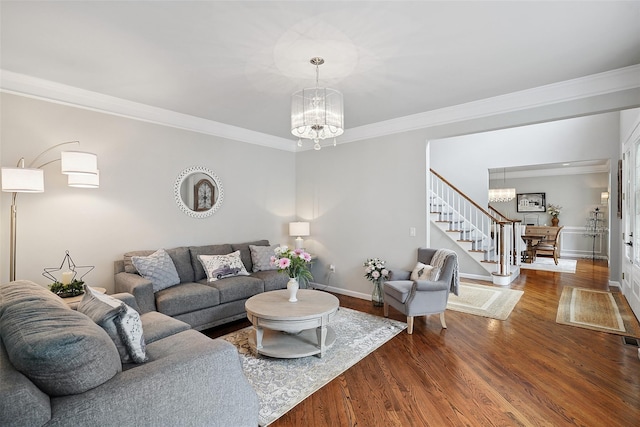 53 Quail Ln, Brewster, NY 10509 - living area with a chandelier, ornamental molding, stairway, and wood finished floors