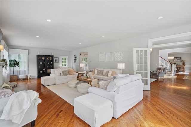 53 Quail Ln, Brewster, NY 10509 - living room featuring stairway, wood finished floors, recessed lighting, and a chandelier