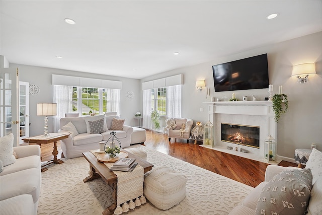 53 Quail Ln, Brewster, NY 10509 - living room featuring wood finished floors, a fireplace, and recessed lighting
