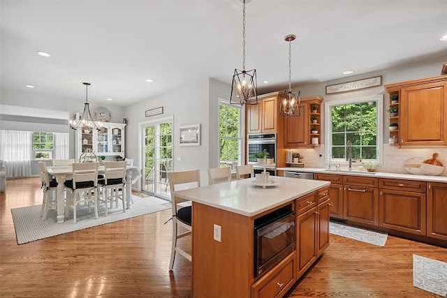 53 Quail Ln, Brewster, NY 10509 - kitchen featuring open shelves, a chandelier, stainless steel appliances, plenty of natural light, and recessed lighting