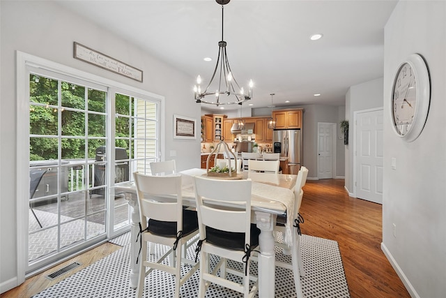 53 Quail Ln, Brewster, NY 10509 - dining area with a chandelier, recessed lighting, and light wood finished floors