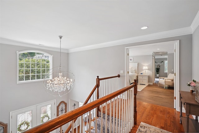 53 Quail Ln, Brewster, NY 10509 - corridor featuring a chandelier, an upstairs landing, ornamental molding, wood finished floors, and recessed lighting