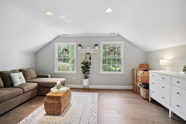 53 Quail Ln, Brewster, NY 10509 - living room with vaulted ceiling, wood finished floors, and recessed lighting