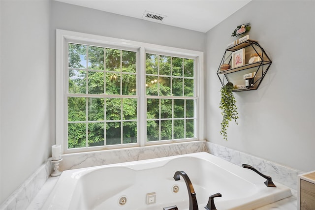 53 Quail Ln, Brewster, NY 10509 - bathroom featuring a tub with jets