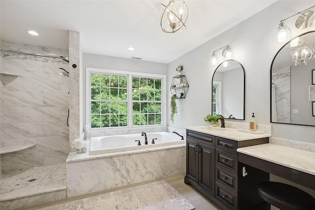 53 Quail Ln, Brewster, NY 10509 - bathroom featuring a garden tub, vanity, a tile shower, wood finished floors, and recessed lighting
