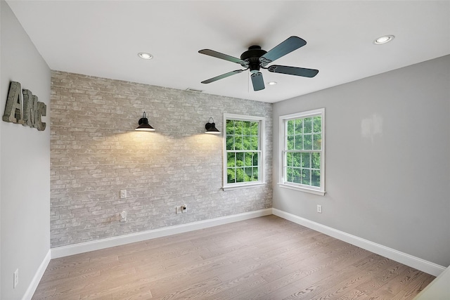 53 Quail Ln, Brewster, NY 10509 - empty room with a ceiling fan, brick wall, wood finished floors, and recessed lighting
