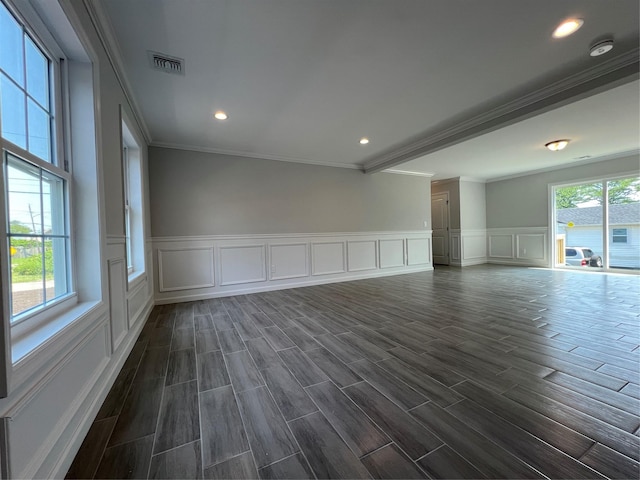 96 Baybright Dr, Shirley, NY 11967 - unfurnished room with a decorative wall, ornamental molding, a smoke detector, dark wood-style flooring, and recessed lighting