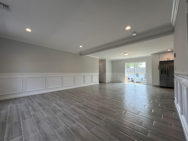 96 Baybright Dr, Shirley, NY 11967 - empty room with a decorative wall, ornamental molding, recessed lighting, and dark wood finished floors