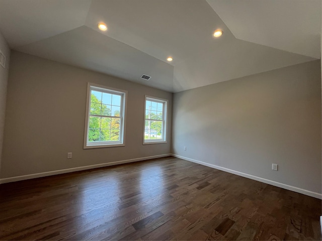 96 Baybright Dr, Shirley, NY 11967 - unfurnished room featuring vaulted ceiling, dark wood finished floors, and recessed lighting