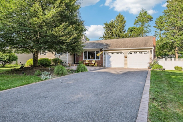 11 Kim Ave, Smithtown, NY 11787 - view of front of property with driveway, an attached garage, a chimney, brick siding, and roof with shingles