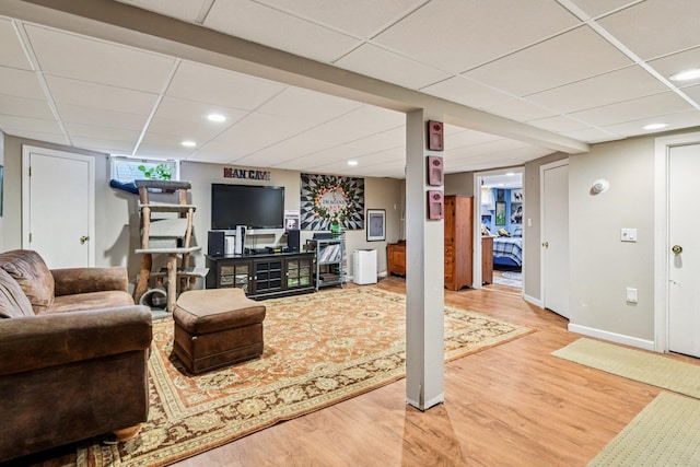 11 Kim Ave, Smithtown, NY 11787 - living room featuring a drop ceiling, light wood-style flooring, and recessed lighting