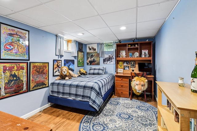 11 Kim Ave, Smithtown, NY 11787 - bedroom featuring a drop ceiling, wood finished floors, and recessed lighting