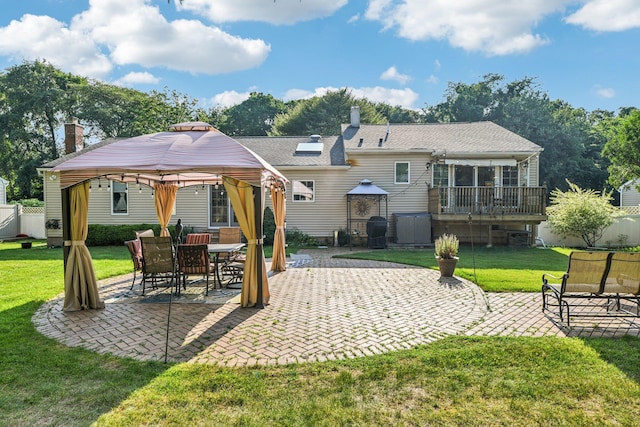 11 Kim Ave, Smithtown, NY 11787 - rear view of house with a gazebo, a patio area, a lawn, and a chimney