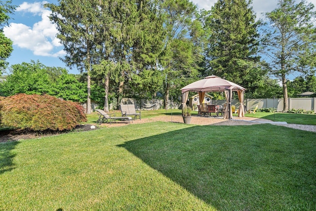 11 Kim Ave, Smithtown, NY 11787 - fenced backyard with a gazebo