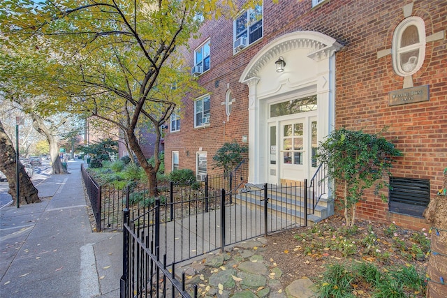 34-15 74th St Unit 5K, Jackson Heights, NY 11372 - doorway to property featuring brick siding