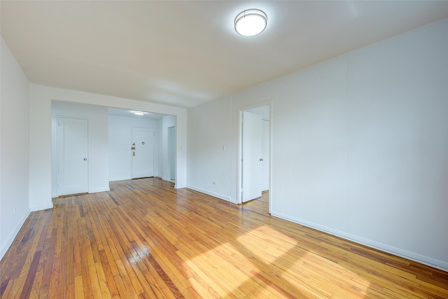 34-15 74th St Unit 5K, Jackson Heights, NY 11372 - spare room with hardwood / wood-style flooring and baseboards