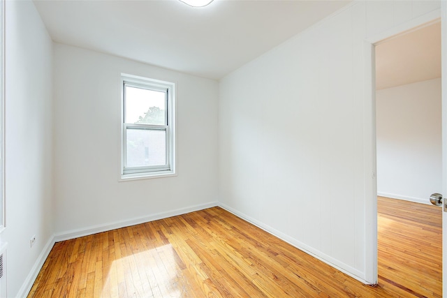 34-15 74th St Unit 5K, Jackson Heights, NY 11372 - unfurnished room featuring light wood finished floors and baseboards