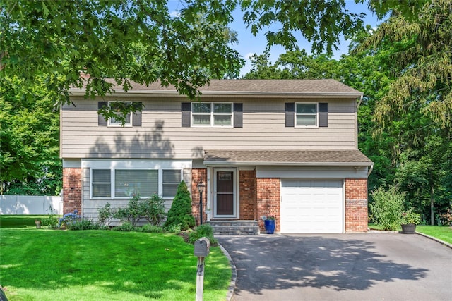 15 Chambers Ct, Huntington Station, NY 11746 - view of front of house featuring asphalt driveway, an attached garage, a shingled roof, and brick siding