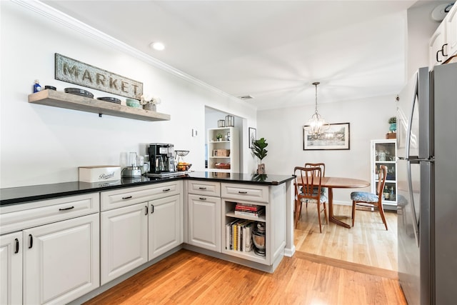 15 Chambers Ct, Huntington Station, NY 11746 - kitchen with freestanding refrigerator, open shelves, ornamental molding, white cabinets, and light wood finished floors
