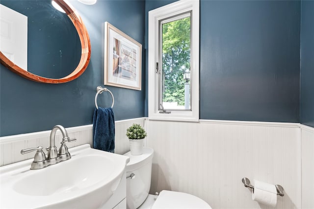 15 Chambers Ct, Huntington Station, NY 11746 - bathroom featuring a wainscoted wall and a sink