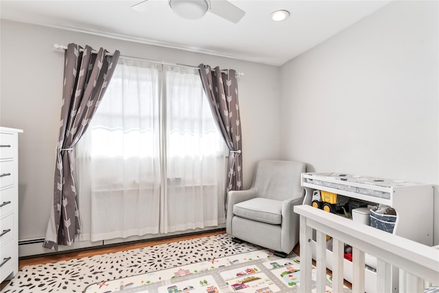 15 Chambers Ct, Huntington Station, NY 11746 - bedroom featuring a crib, ceiling fan, and recessed lighting