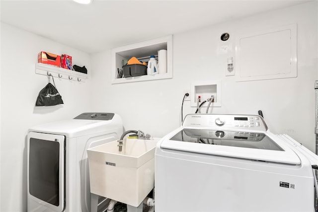 15 Chambers Ct, Huntington Station, NY 11746 - laundry room with washing machine and clothes dryer