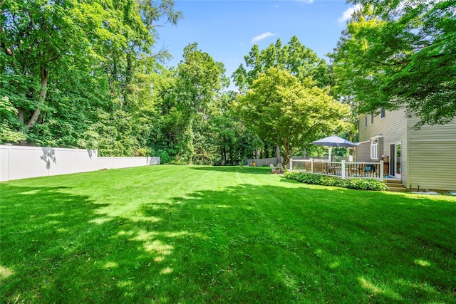 15 Chambers Ct, Huntington Station, NY 11746 - view of yard featuring a deck